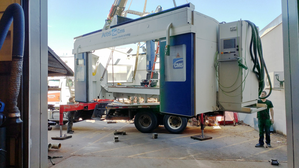 Moving equipment into the new Interaction Lab space at Interurban Campus.