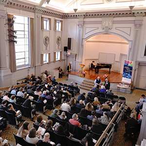 A mid-size auditorium featuring classical architecture. 