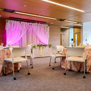 A modern light filled space set up for a wedding ceremony.