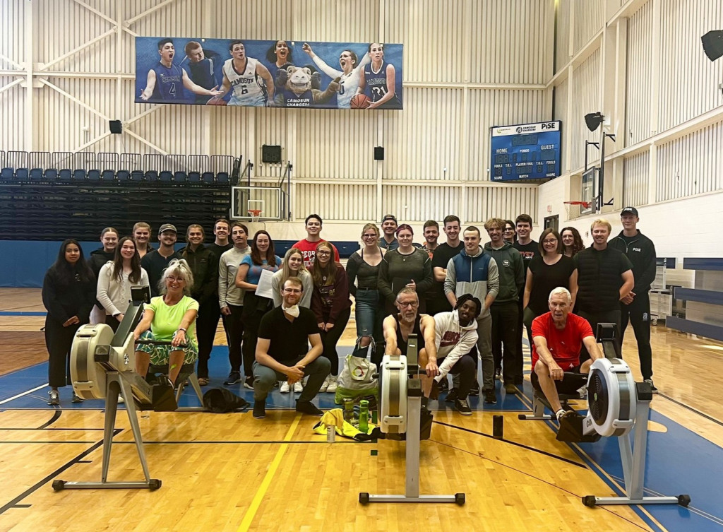 Three masters rowing athletes are joined by Kinesiology students and instructors