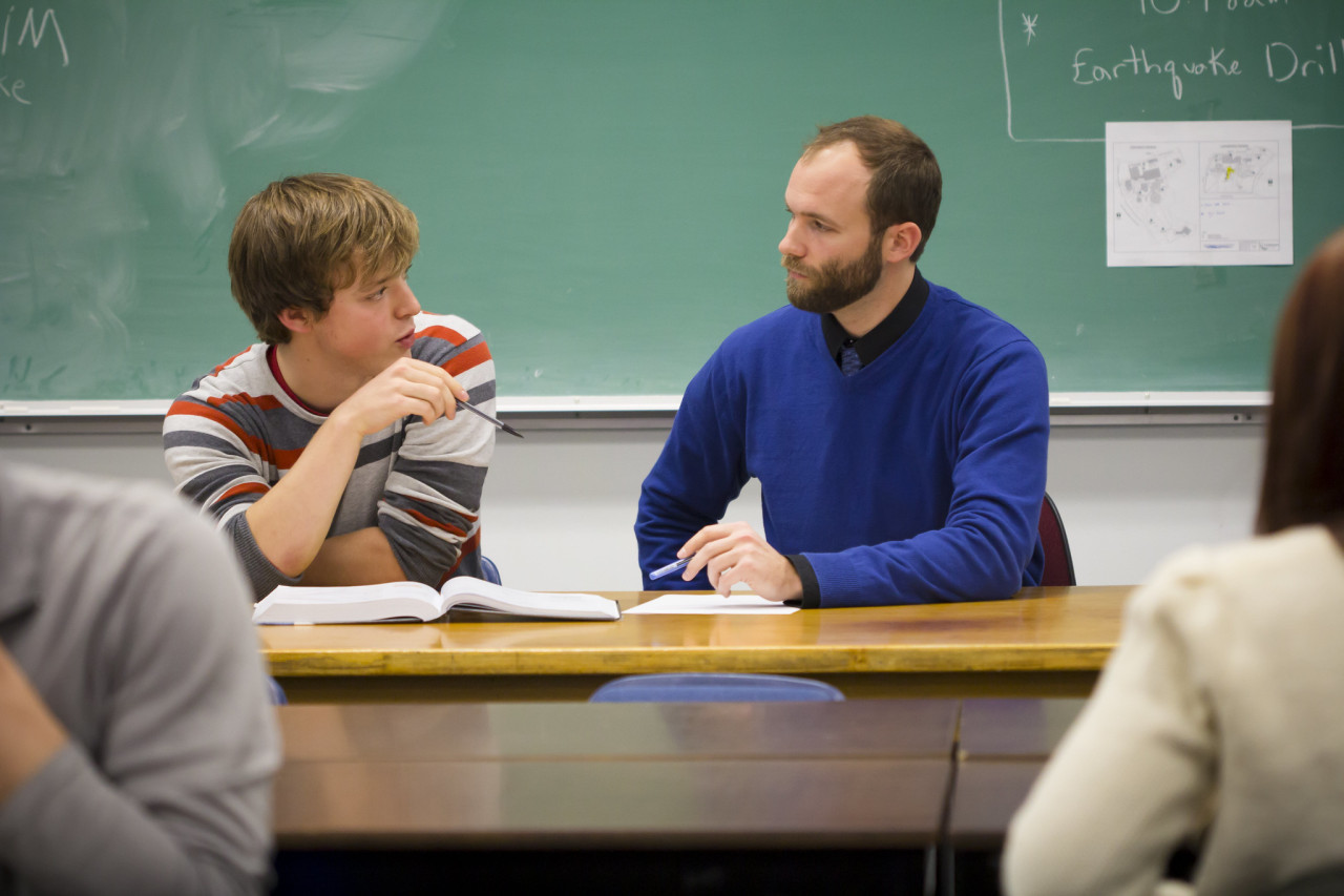 a student working on on one with an instructor