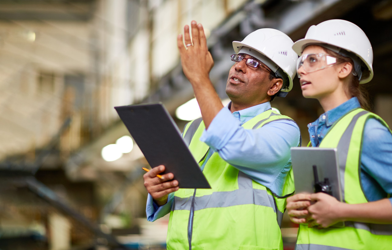 Instructor with student on jobsite 