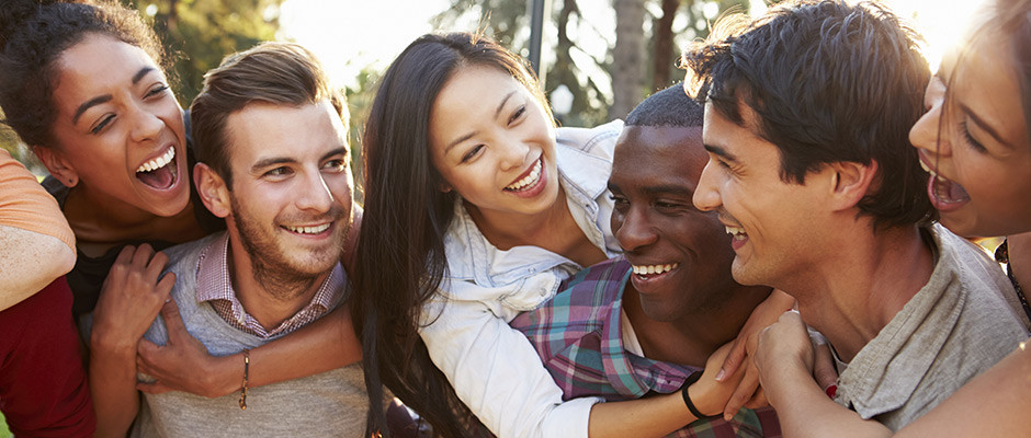 friends laughing and hugging