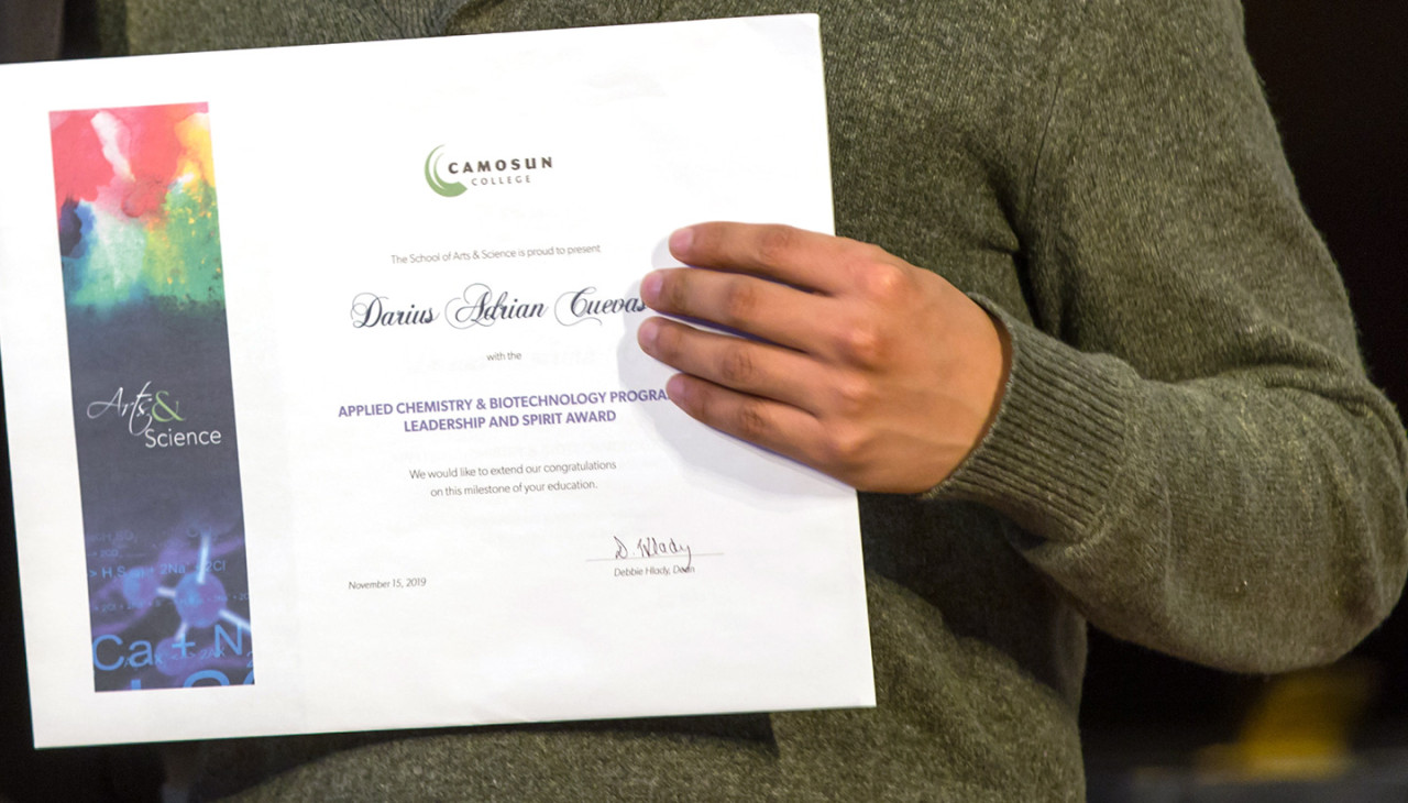 close up of an award certificate printed on cotton rag paper