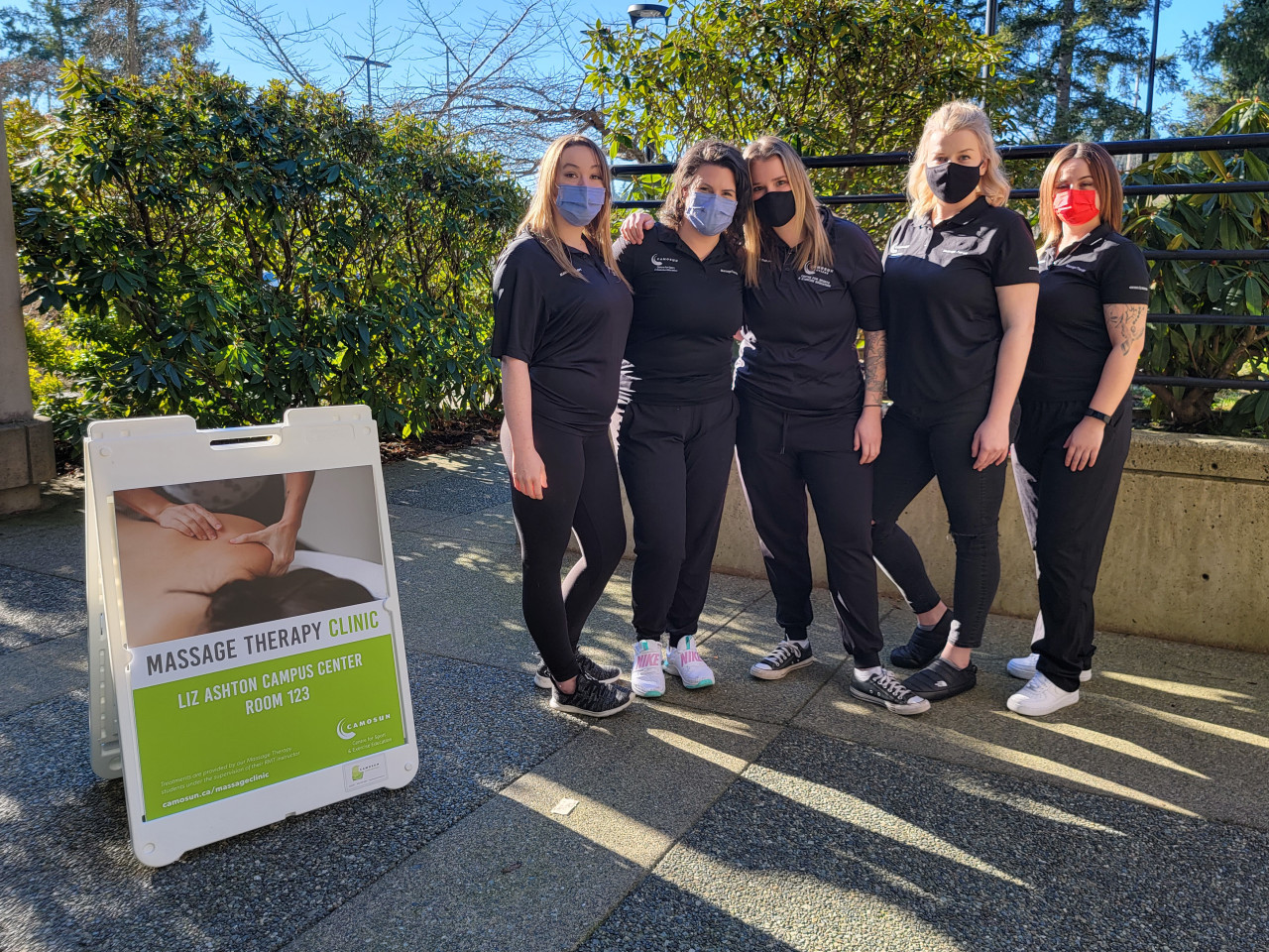 Five students stand outside at Camosun's Interurban campus.