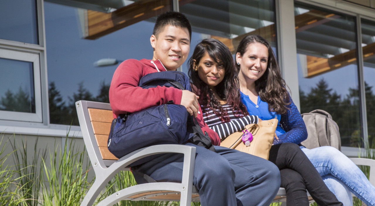 Students sitting on bench