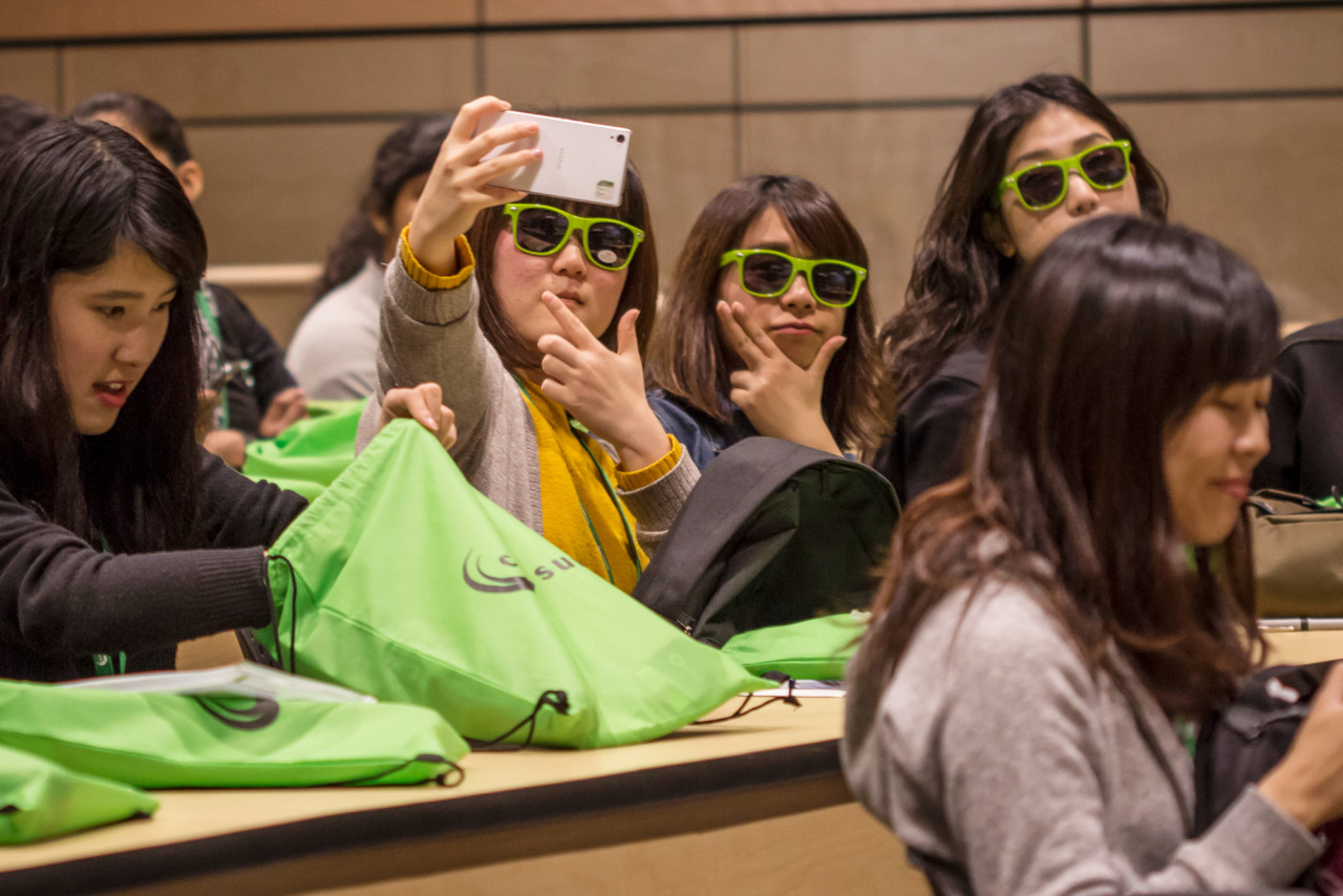 An International Student Taking a Selfie with a friend at an orientation event.