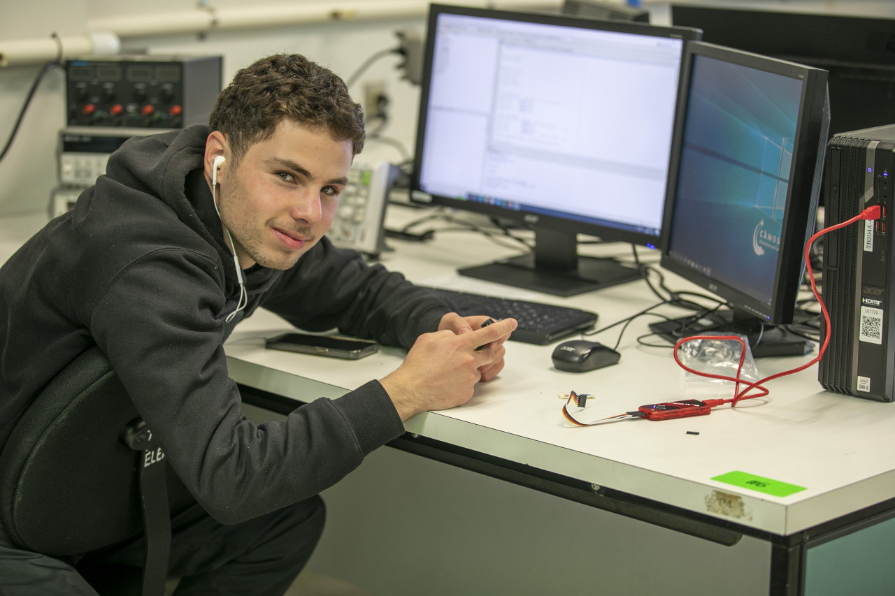 Dual Credit student working on a project