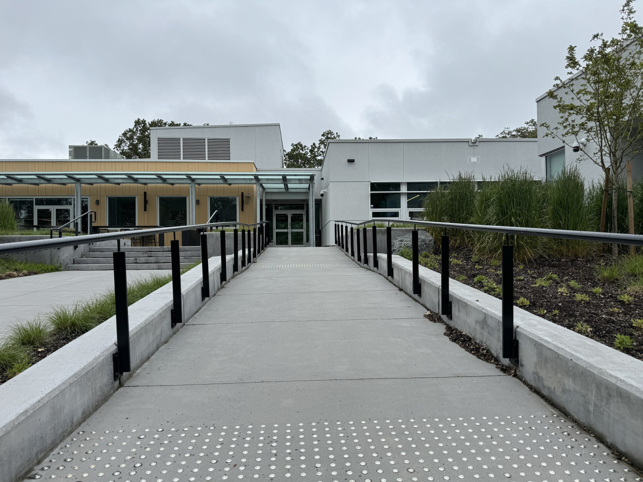 A ramp leads to the entrance of Wilna Thomas building.