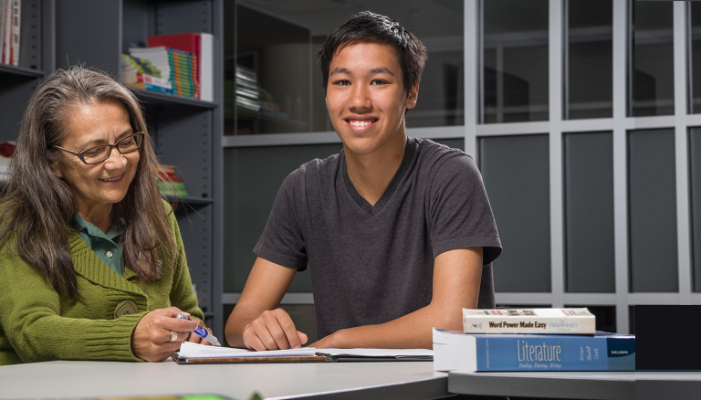 Songhees student and teacher in a tutoring session.